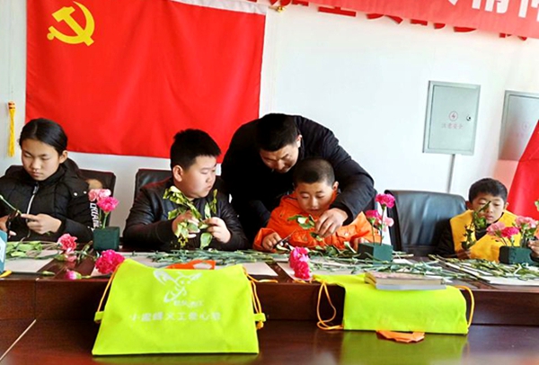 春暖童心 花开四季 精准扶贫进行时——内蒙古包头义工少儿部陪固阳留守儿童过小年