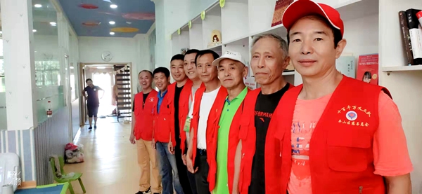 本溪市平山区十百千万义工队、公益在线本溪工作站开展全国残疾预防日公益活动